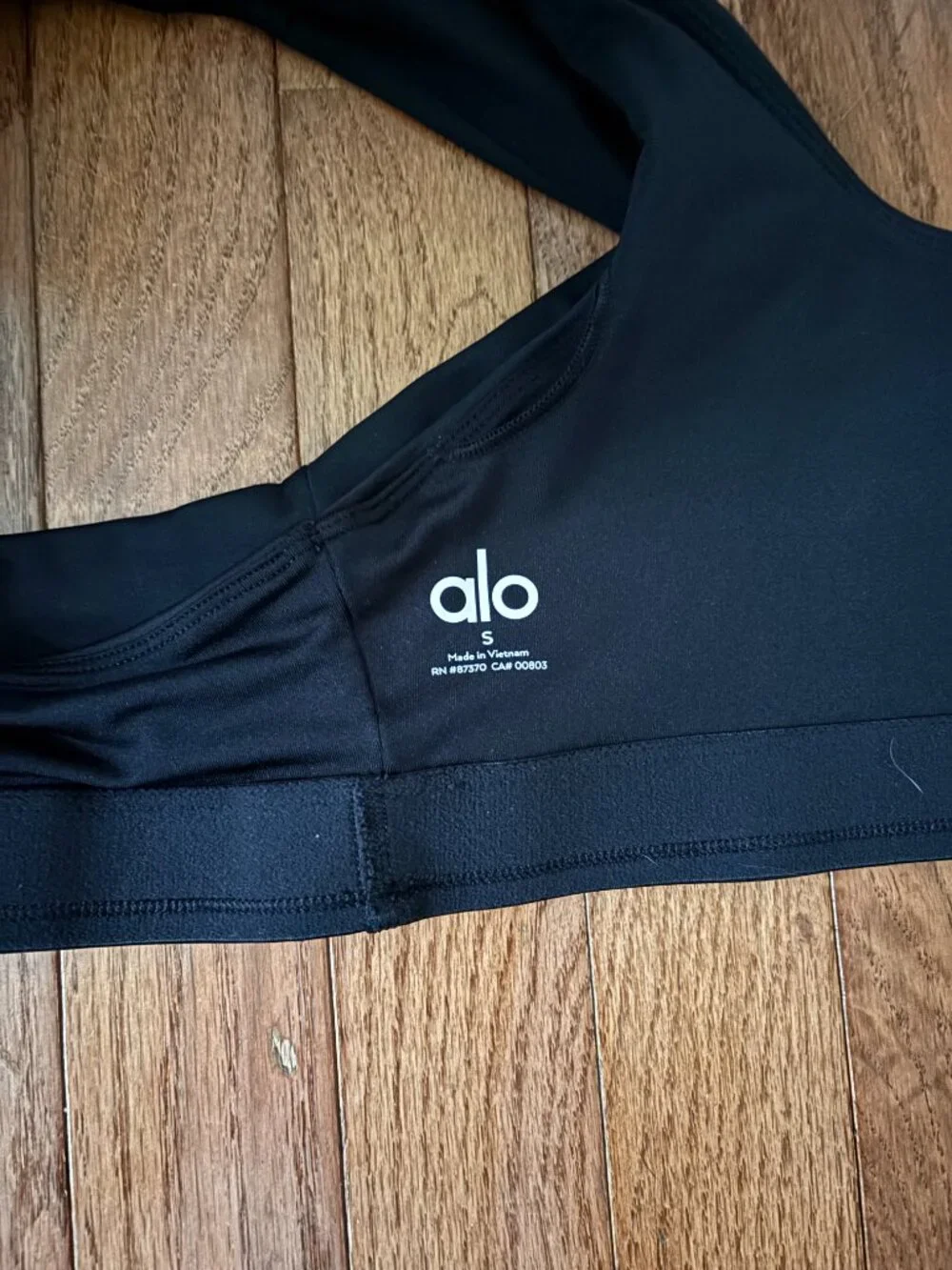 ALO Yoga Black Racerback Sports Bra with Iconic White Logo